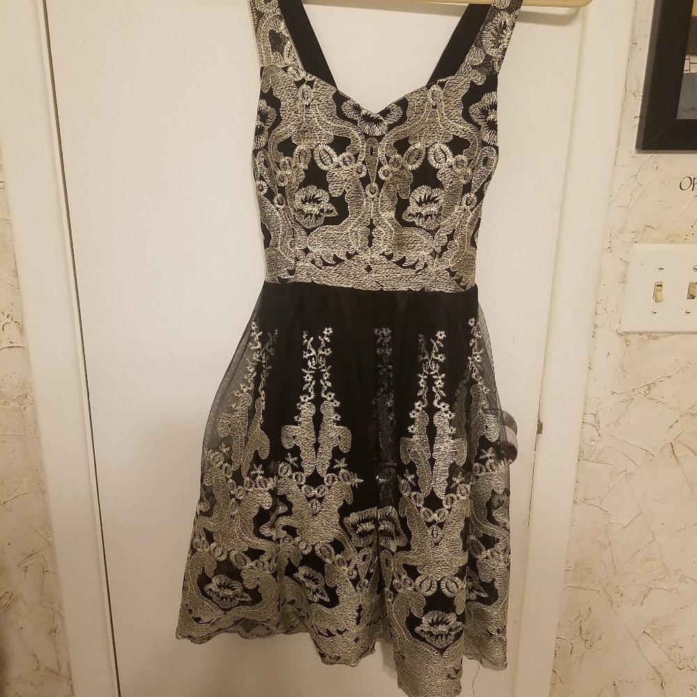 Aniina dress size M,